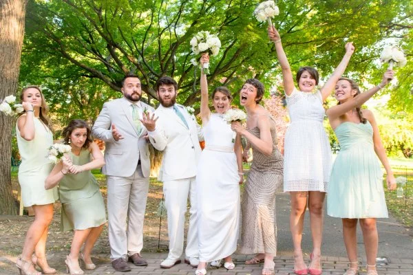 Wedding party celebrating in the gardens near The Inn at Centre Park
